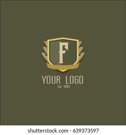 Letter F logo design. Luxury shield crown brand concept. Classic emblem sign.