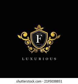 Letter F logo with Luxury Gold Shield. Elegance logo vector template