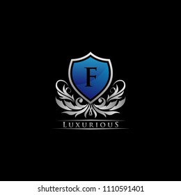 Letter F Luxury Guard Icon Logo. silver and blue color.