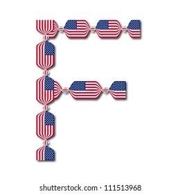 Letter F made of USA flags in form of candies on white background