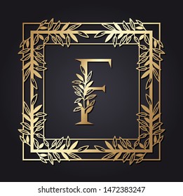 letter F in square frame with leafs