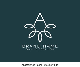 Ein Buchstabe mit Vorlage für das Blumenlogo.
