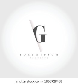 The letter G is inserted into the paper slot template element