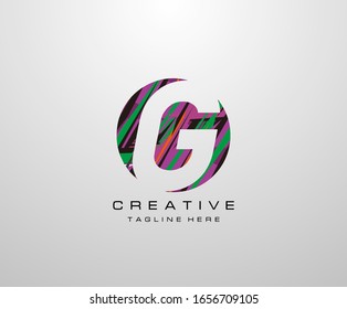 Letter G Logo. Abstract Circle G letter design, made of various geometric shapes in color.