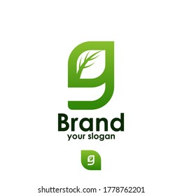 logotipo de letra g y ramas de hoja con fondo blanco