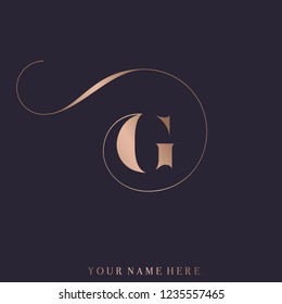 Letter G logo.Elegant typographic icon isolated on dark background.Uppercase lettering sign in rose gold metallic color.