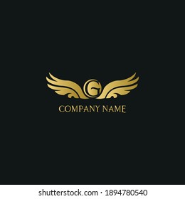 letter G and wings in luxury and elegant golden style logo design