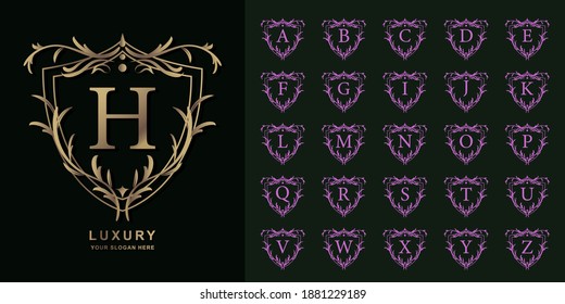 Letter H or collection initial alphabet with luxury ornament floral frame golden logo template.