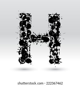 Letter H formed by black and white ink blots