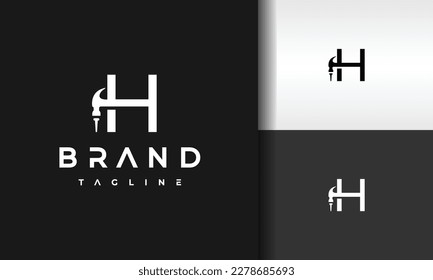 letter H hammer nail logo