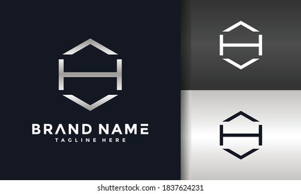 la letra logotipo del hexágono H