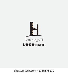 letter h illustration of a simple logo night building. vector design