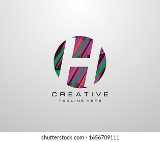 Letter H Logo. Abstract Circle H letter design, made of various geometric shapes in color.