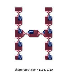 Letter H made of USA flags in form of candies on white background