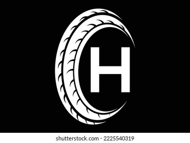 Letter H monogram alphabet With a Sport Car Automotive Car Repair Logo Design Concept With Transport Tire Icon Vector Template.