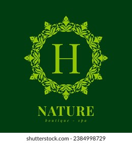 letter H nature border wreath initial logo for boutique spa and beauty wellness