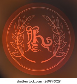 Letter h.
One letter inscribed in a circle as a print, framed by a laurel wreath.