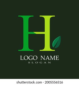 
letter H theme logo with a combination of leaves, nature theme, green