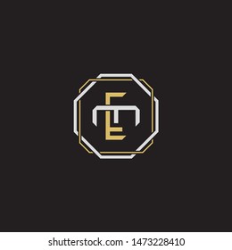 Letter initial EM E M ME monogram logo classic style with emblem hexagon line isolated on black background and gold silver colors combination