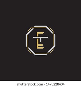 Letter initial ET E T TE monogram logo classic style with emblem hexagon line isolated on black background and gold silver colors combination