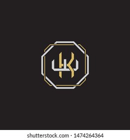 Letter initial KW W K WK monogram logo classic style with emblem hexagon line isolated on black background and gold silver colors combination