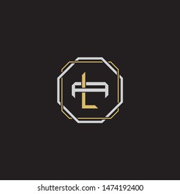 Letter initial LA L A AL monogram logo classic style with emblem hexagon line isolated on black background and gold silver colors combination