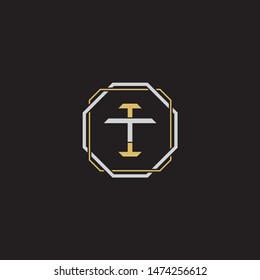 Letter initial IT I T TI monogram logo classic style with emblem hexagon line isolated on black background and gold silver colors combination