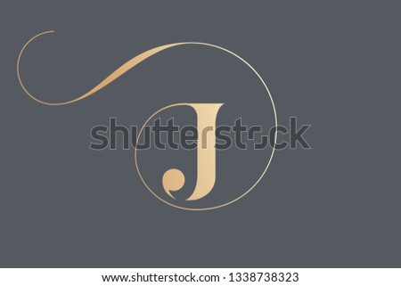 Letter J logo.Typographic icon in golden color isolated on dark background.Serif uppercase lettering.Initial character with round frame and swirl.Luxury style sign.