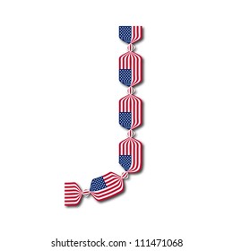 Letter J made of USA flags in form of candies on white background