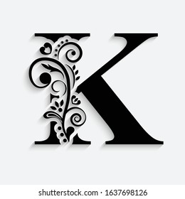 letter K. Black flower alphabet.  Beautiful capital letters with shadow