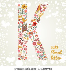 The letter K. Bright floral element of colorful alphabet made ??from birds, flowers, petals, hearts and twigs. Summer floral ABC element in vector