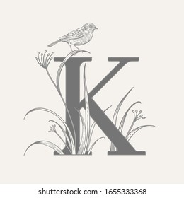 Letter K, decorative herbs, cute flowers and bird isolated. Vector decoration. Black and white. Vintage illustration. Floral pattern for greetings, wedding invitations, text design.