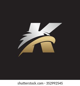 letter K eagle head silver gold logo black background