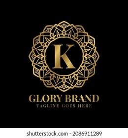 letter K glory mandala vintage golden color luxury vector logo design