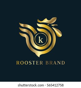 Letter K golden rooster logo