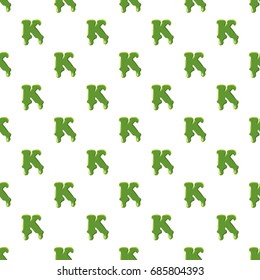 Letter K from latin alphabet with numbers and symbols made of green slime. Font can be used for Halloween design and other purposes