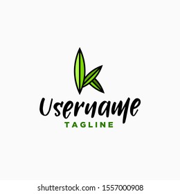 letter K logo design inspiration . leaf shapping the letter K . green K leaf logo template