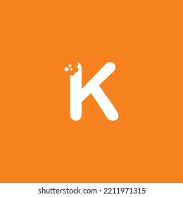 letter K logo design with unique creative bite marks in modern style in white on orange background. cute letter K illustration. suitable for business logo, company, marketing, promotion, food, etc