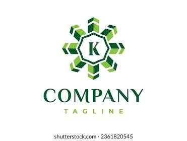 Letter K logo in the green arrow-shaped frame.