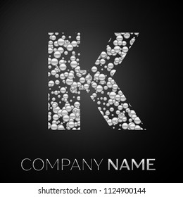 Letter K logo silver dots. Alphabet logotype with abstract silver bubbles shape on black background. Vector template for your design