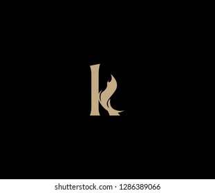 Letter K lowercase elegant gold flame swoosh monogram logo design
