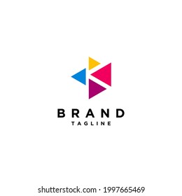 The letter K is in the negative space between four colorful triangles