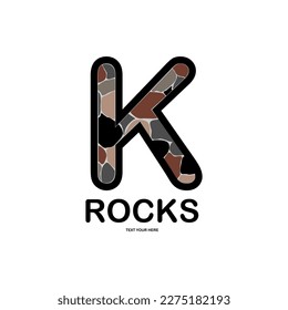 Letra k con ilustración de logotipo con rocas
