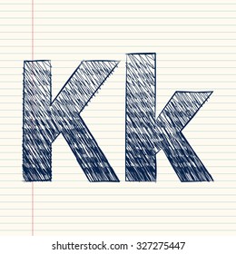 letter K sketch in a notebook
