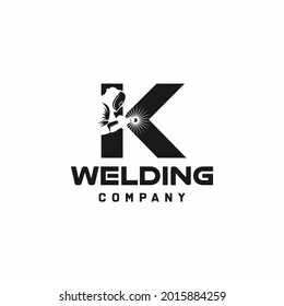 Letter K welding logo, welder silhouette working with weld helmet in simple and modern design style