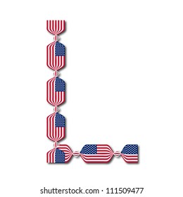 Letter L made of USA flags in form of candies on white background