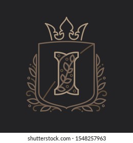 Letter I logo consisting of floral pattern letters in a heraldic shield with crown. Can be used for security, hotel, resort, restaurant, boutique, jewelry, interior and fashion industry.