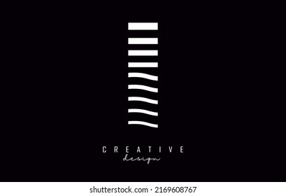 Letter I logo design with white straight and zig zag lines. Vector illustration with wavy lines. 