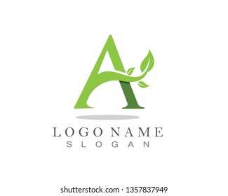 A letter logo with green leaf