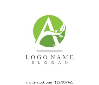 A letter logo with green leaf